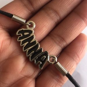 Anna Necklace with black rope .